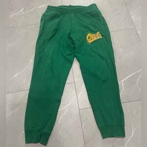 OVO green jogging pants with embroidered Owls patch. Size Medium.